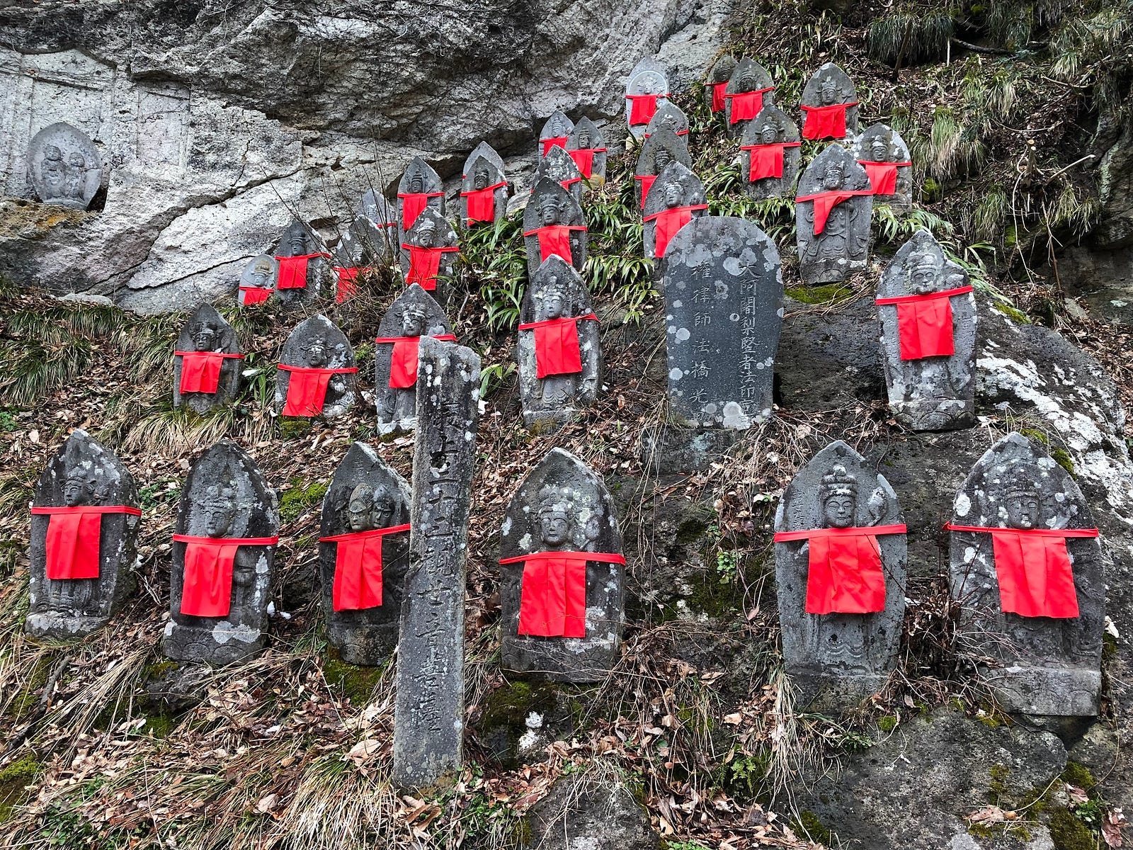 Jizo statues on a hill in Yamadera, a mountain escape near Zao-san (Mt. Zao).