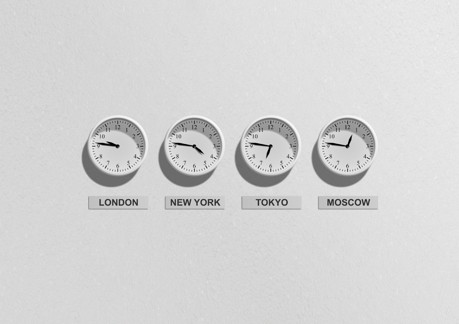 4 clocks showing different time zones