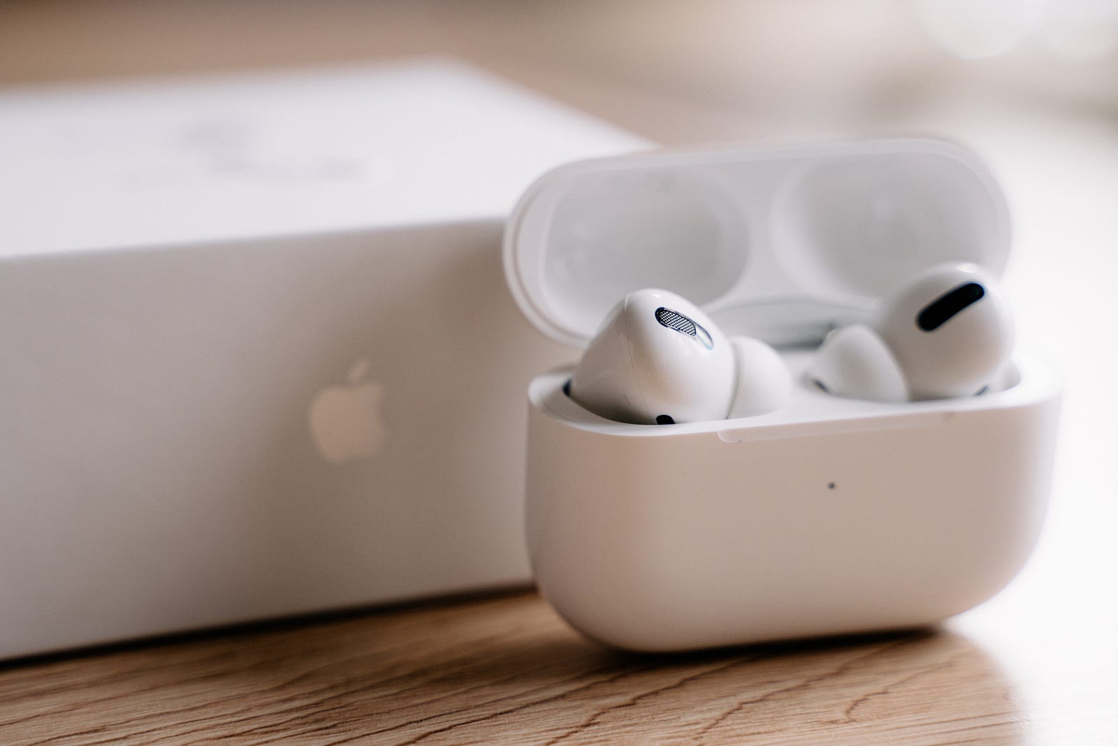 Airpods Pro 2 image next to it's packaging