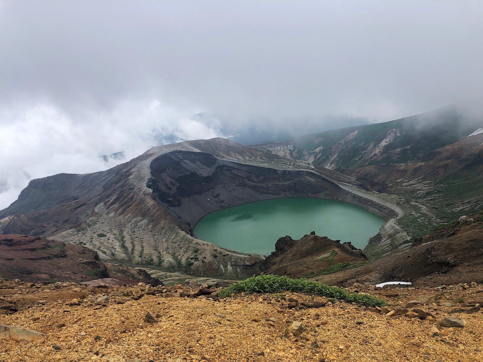 Zao-san’s emerald green crater lake in the middle of summer. Zao-san is one of the 100 Famous Mountains of Yamagata.