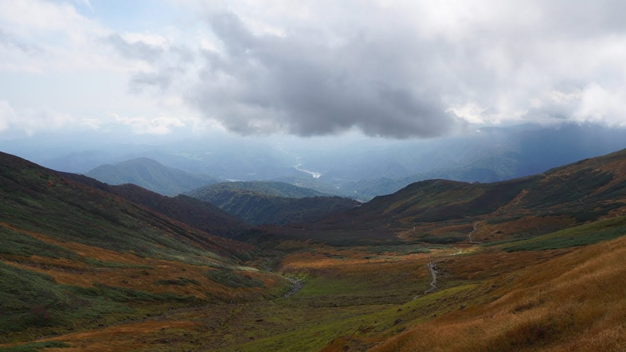 The orange hills of Ubaga-take in the autumn leaves. Ubaga-take is one of The 100 Famous Mountains of Yamagata.