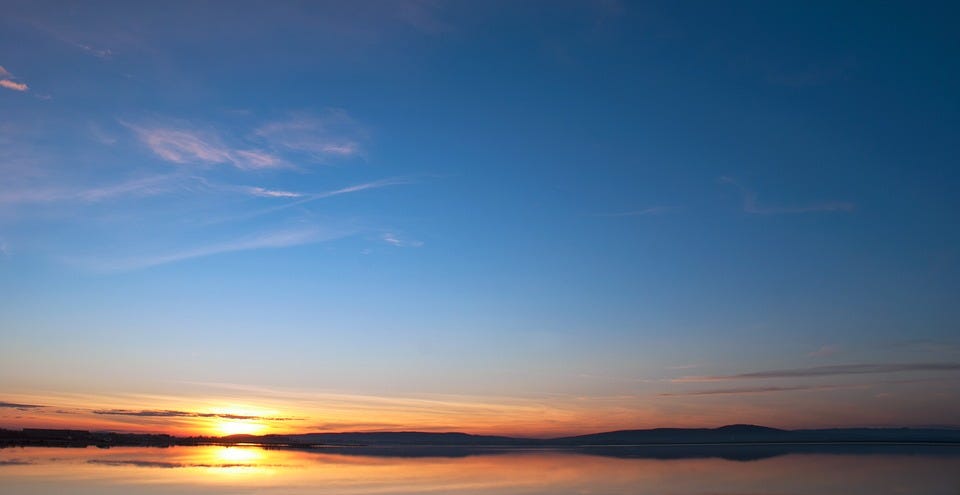 sunset over broad horizon