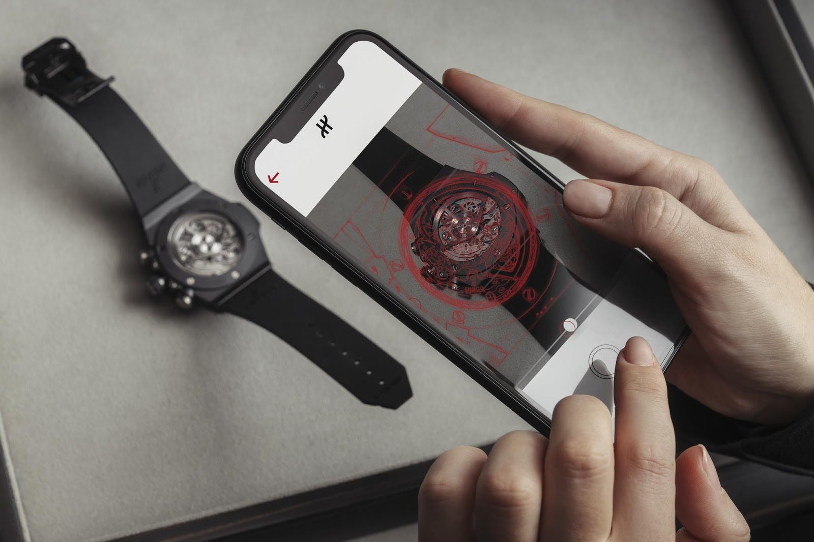Aura’s app scanning a Hublot watch