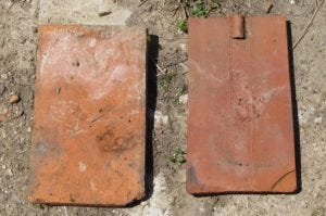 TIles showing the ergots or cast-in hanging hooks damp