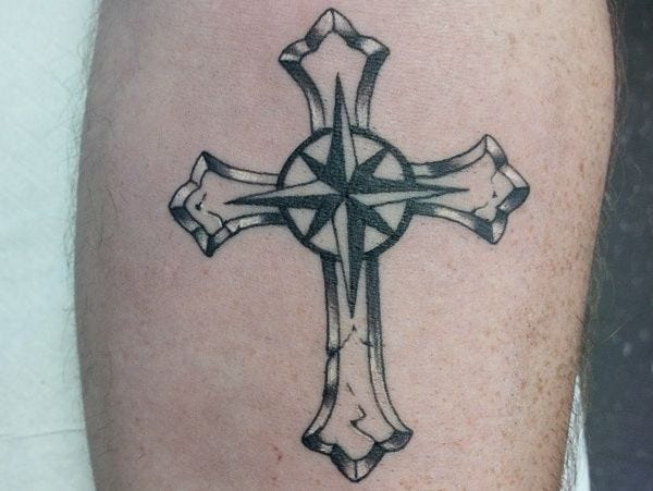 Featured image of post Tatuagem De Cruz Feminina Com Flores