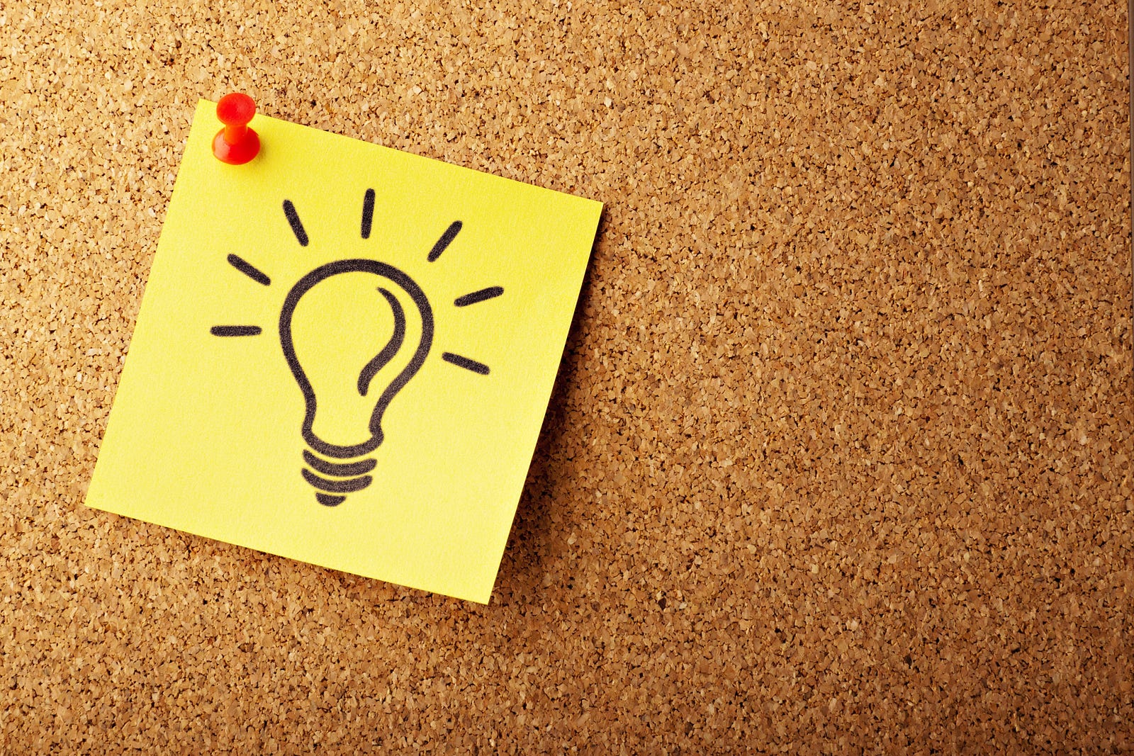A post-it sticker has a lightbulb drawn on it. The sticker has a tack (in its upper left corner) pinning the paper to a cork board. A 2015 study published in the International Journal of Obesity emphasized the importance of behavior change strategies in achieving sustained weight loss.