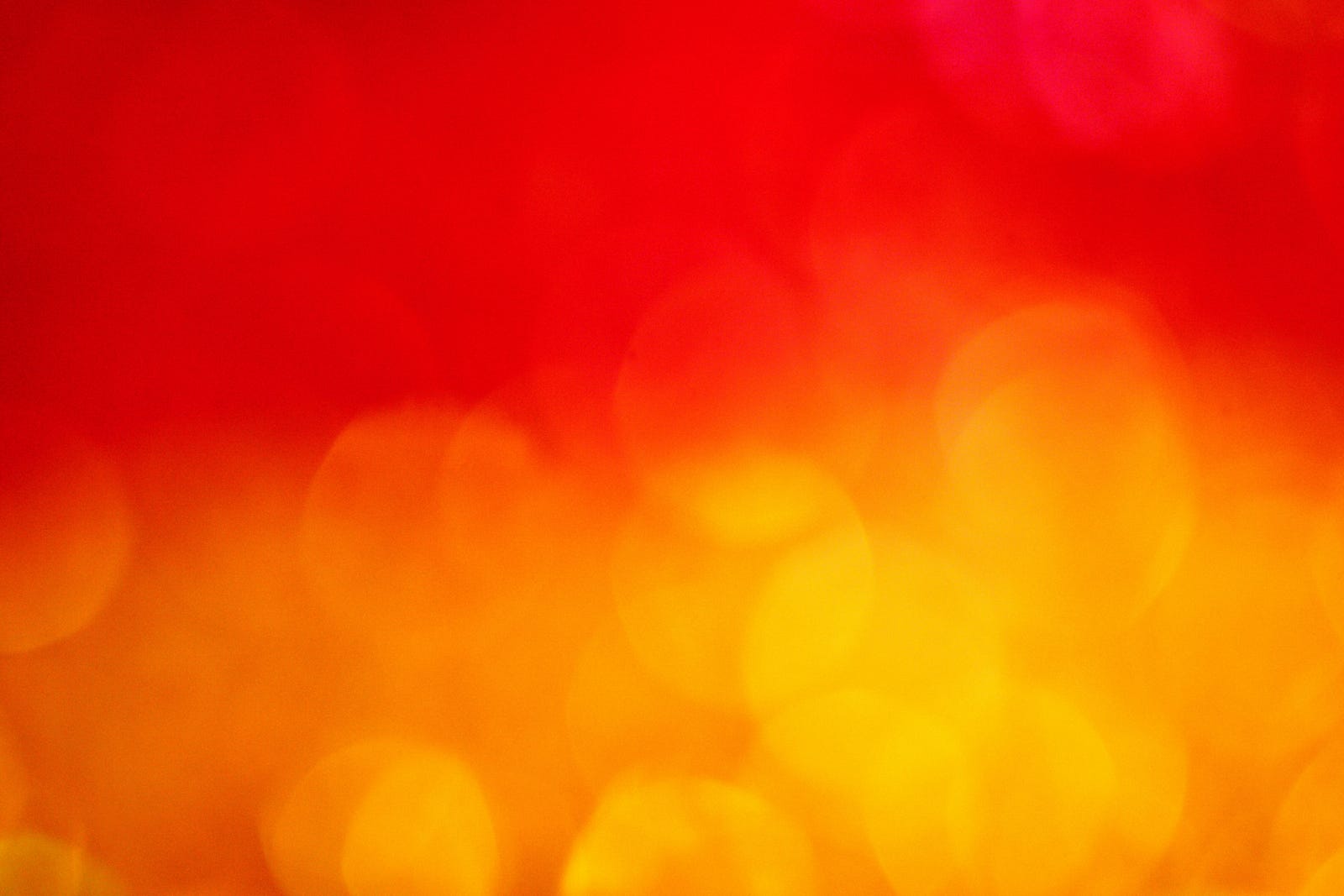 An abstract photo of heat, manifest as yellow colos at the image bottom and red at the top. At least 80 percent of women on endocrine therapy for breast cancer experience hot flashes and other menopausal symptoms.