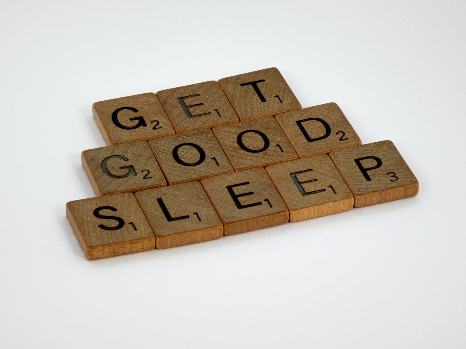 Scrabble tiles spell out “GET GOOD SLEEP.” Researchers used a prospective cohort design based on the U.K. Biobank (UKB) to examine the associations between sleep quality and health span (how well you live). Healthy sleep quality was associated with a reduced risk of premature end of healthspan, suggesting healthy sleep behavior may extend health span.
