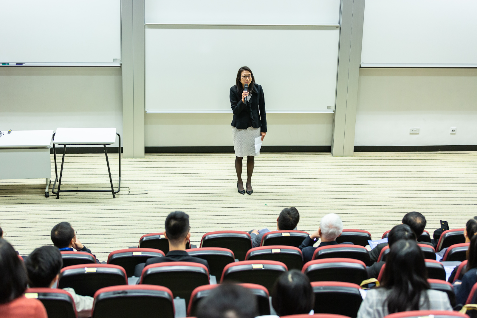 a woman giving lecture