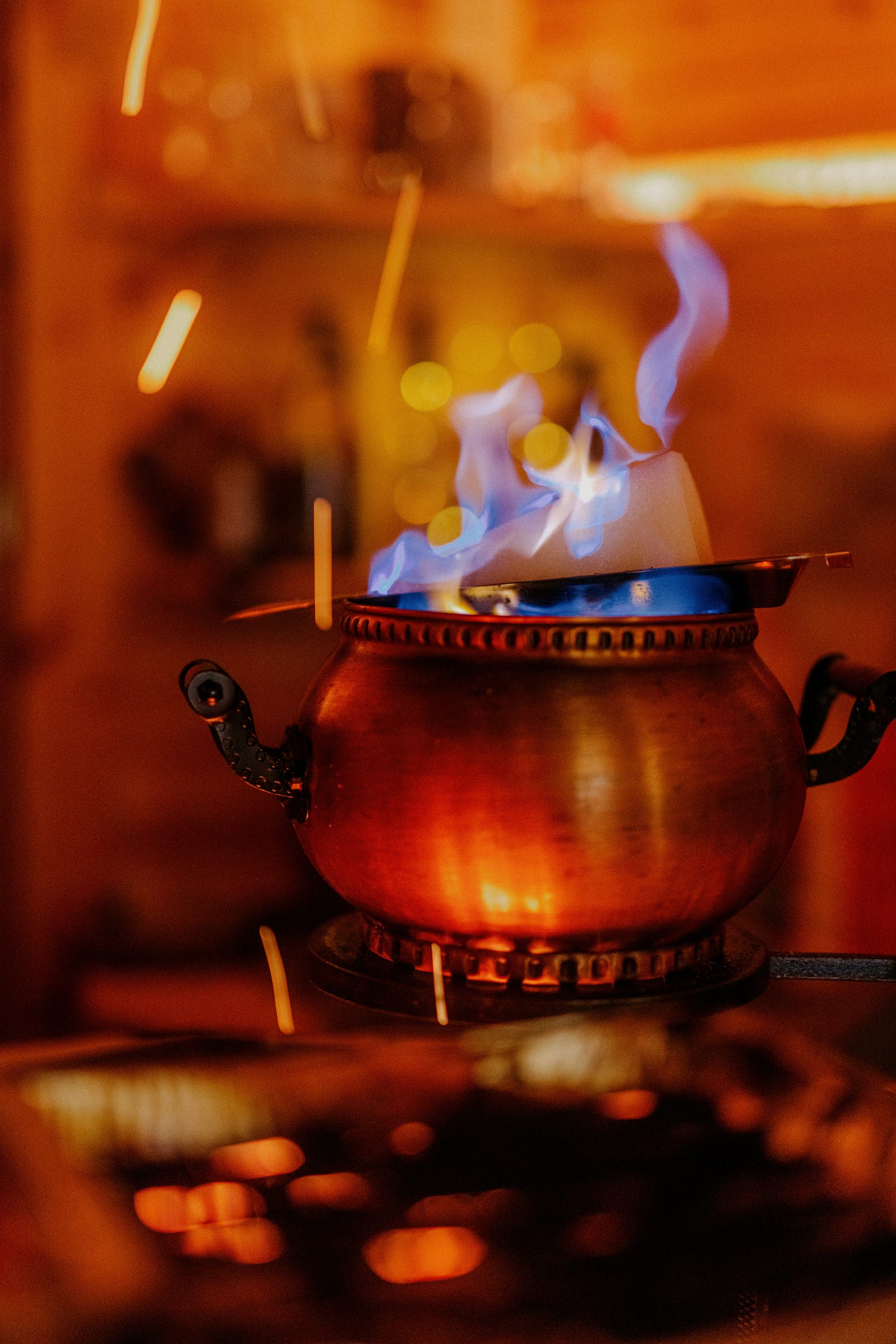 Boiling water in a copper pot. Boiling tap water effectively removes 90 percent of microplastics