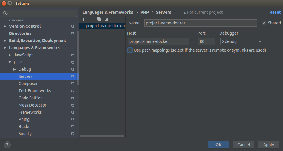 Để PhpStorm thiết lập kết nối XDebug, bạn cần thêm máy chủ cục bộ vào PHP->Servers configuration