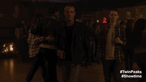 James and Freddy in Roadhouse interior with neon signs animated GIF