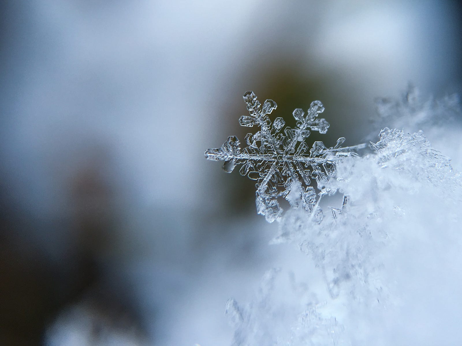 Ice crystals in close-up. I slipped on a sheet of ice two years ago. My right leg went backward, approaching my head. Searing pain worse than anything I had ever experienced.