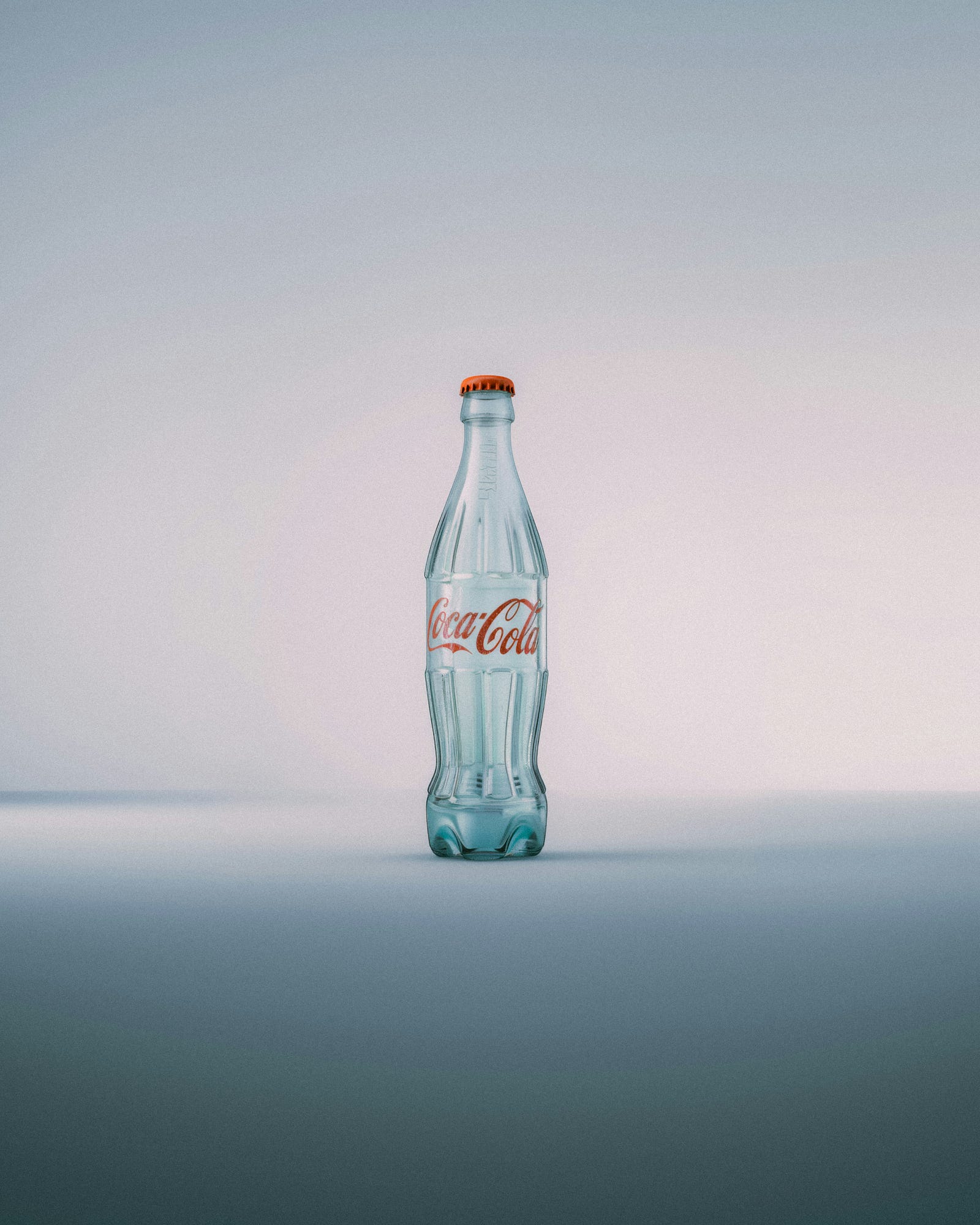 An empty Coca Cola bottle. Poor diet can lower testosterone levels.