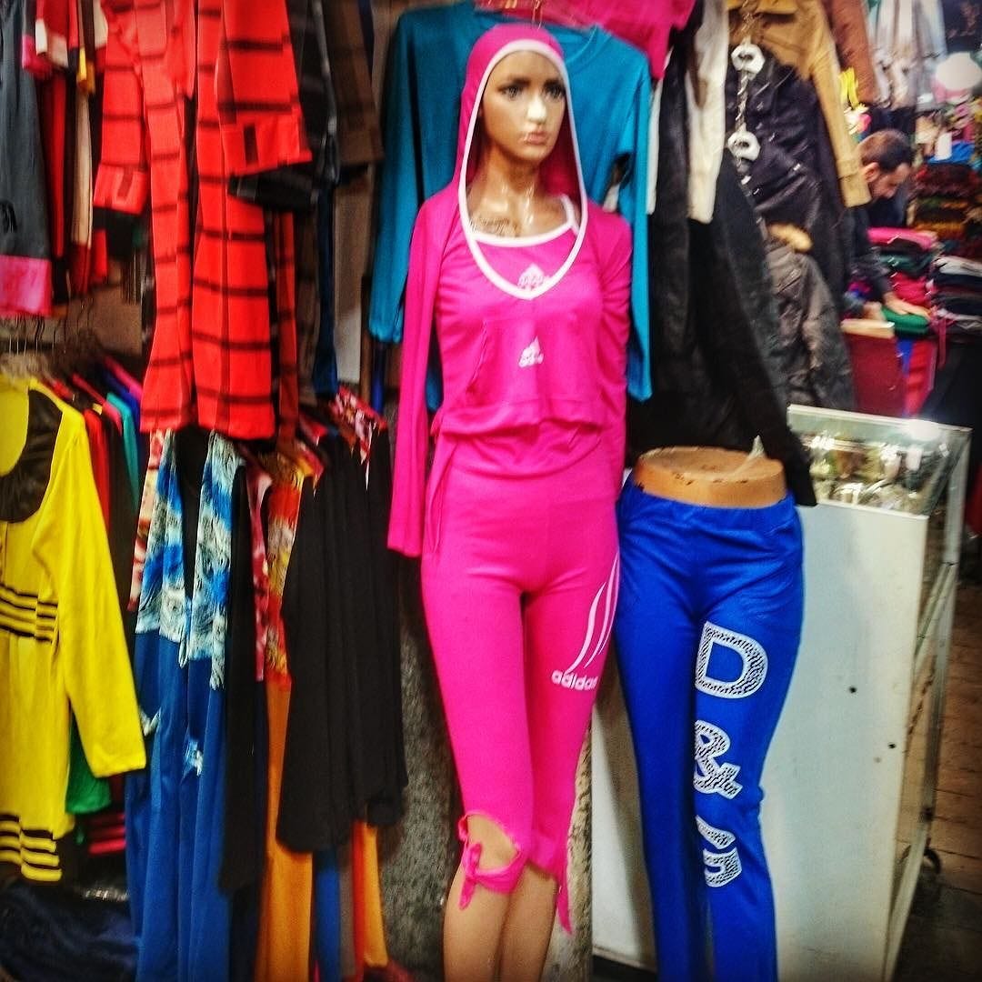 An Odd Dichotomy In This Store Model Pink Sports Top And Long