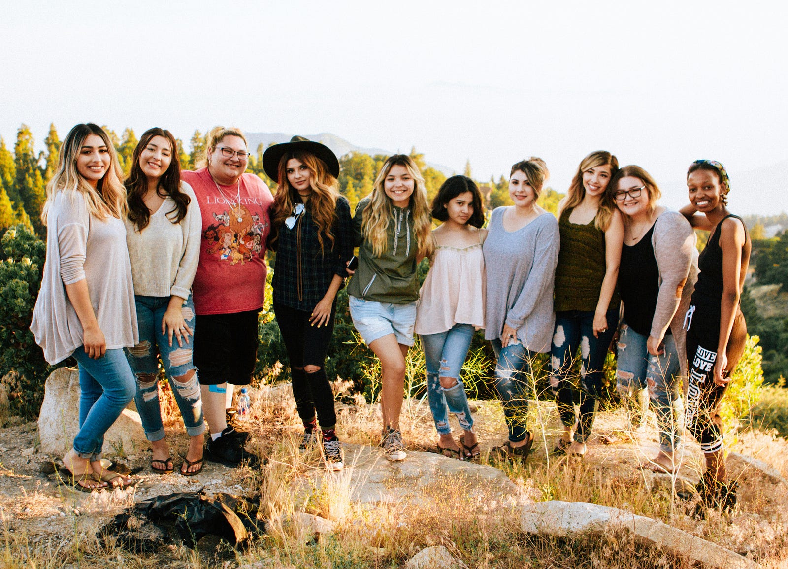 A picture of ten women, all smiling. About one in eight in the U.S. will develop breast cancer.
