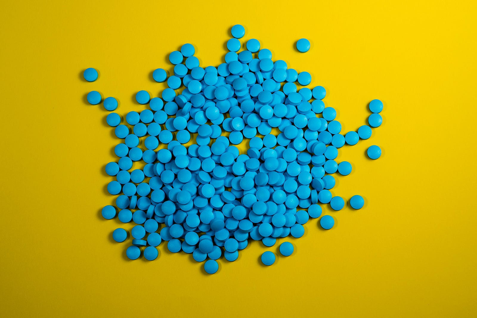 Dozens of blue Viagra pills for erectile dysfunction.