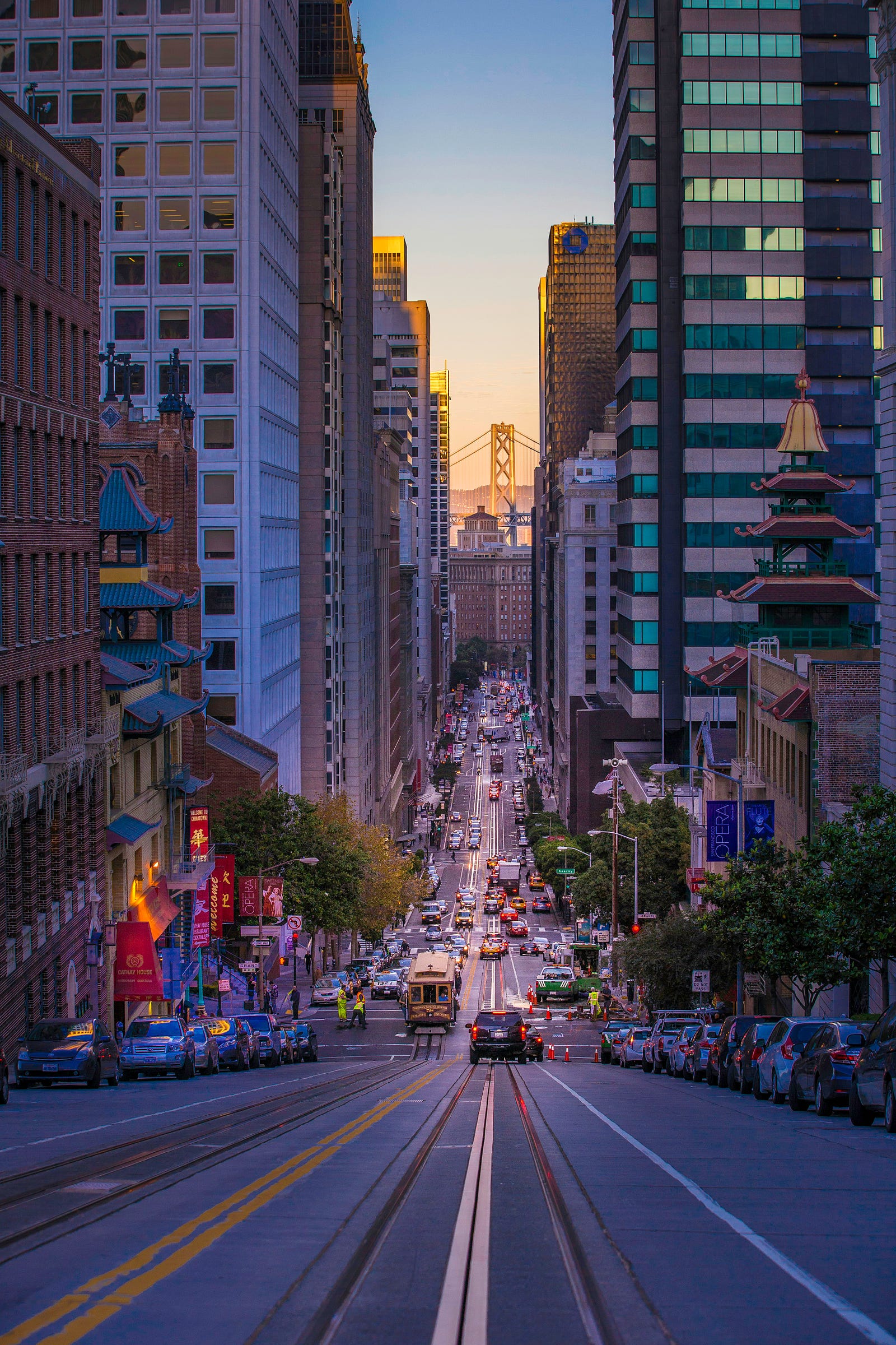A city street seen end on and from a slight elevation.