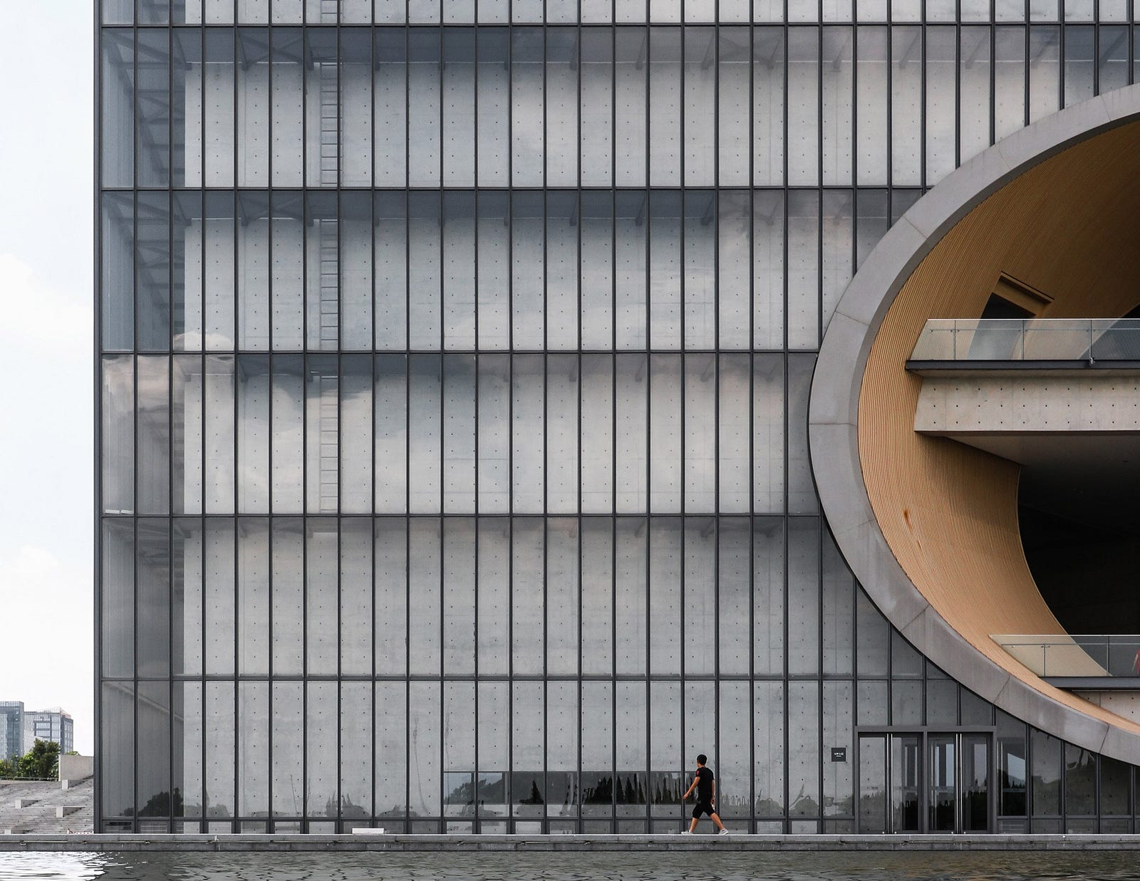 Tadao Ando's Poly Grand Theatre photographed by Yueqi Li