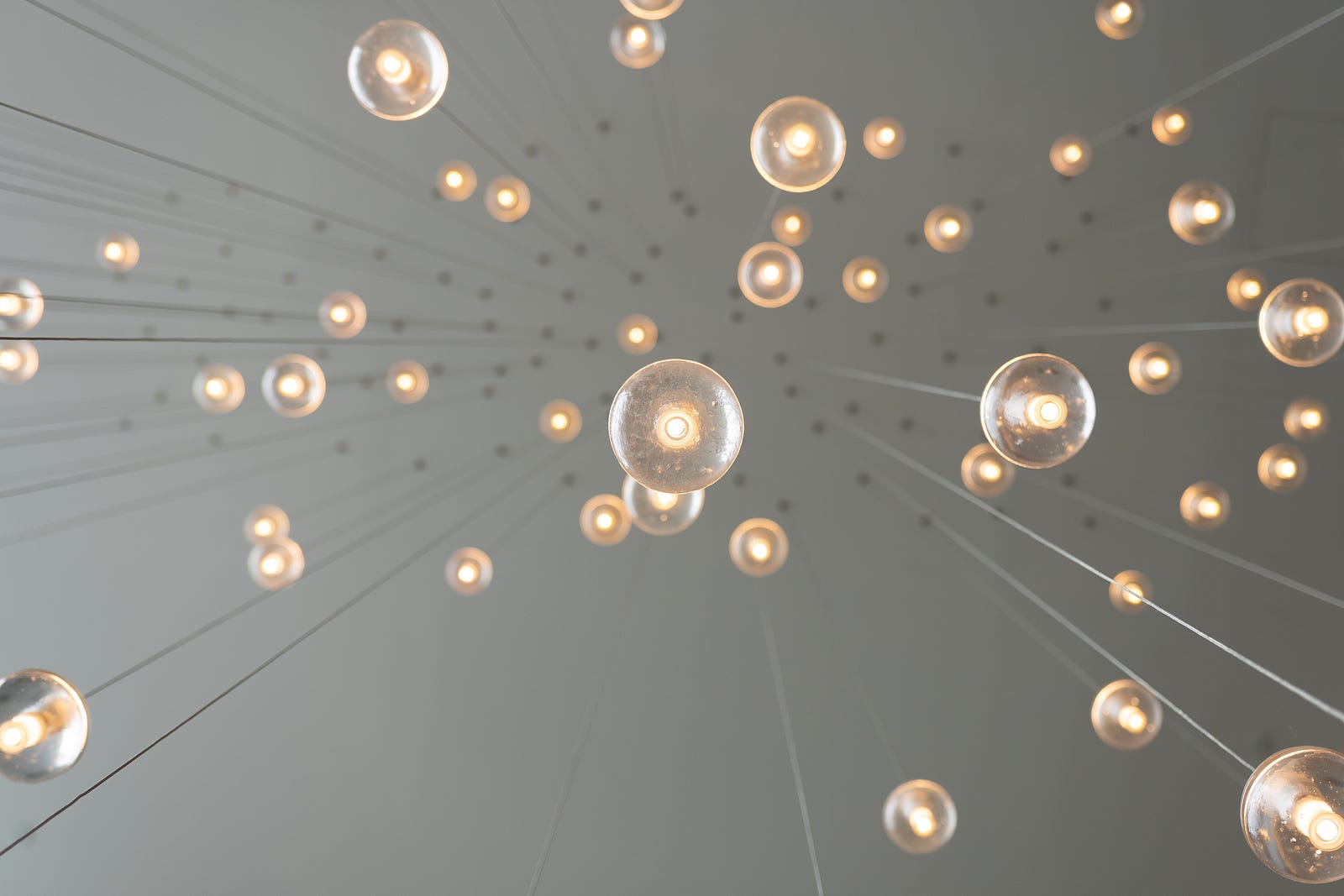 We look upward to see dozens of old-fashioned round light bulbs hanging from thick wires. Compared with usual treatment, patients with dementia who received phototherapy had significant improvements in cognitive function. Those receiving phototherapy appeared to see drops in severe agitation.