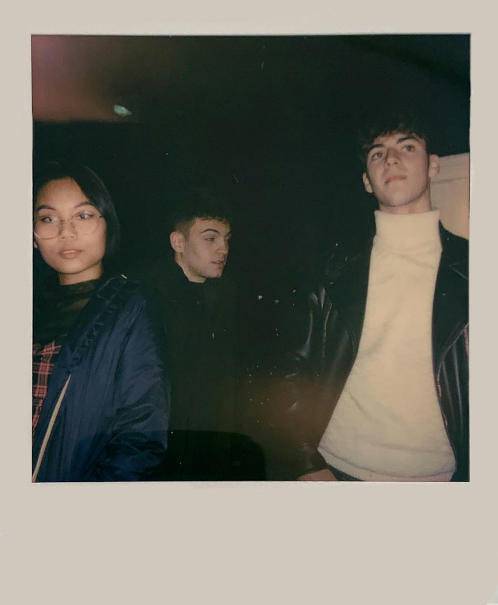 Three young people in a Polaroid picture. Colorectal cancer is rising in incidence among those under age 55.