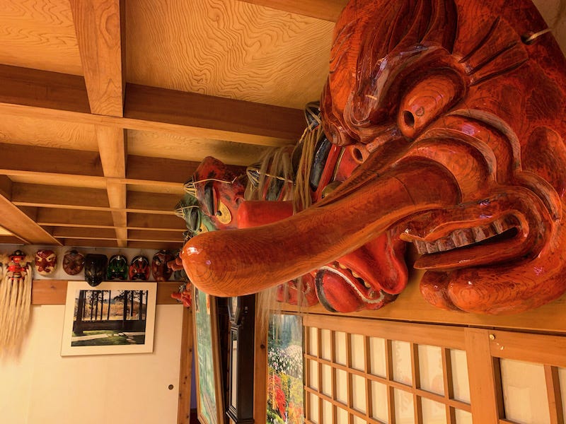 Tengu masks hang in one of Furumine Shrine’s halls