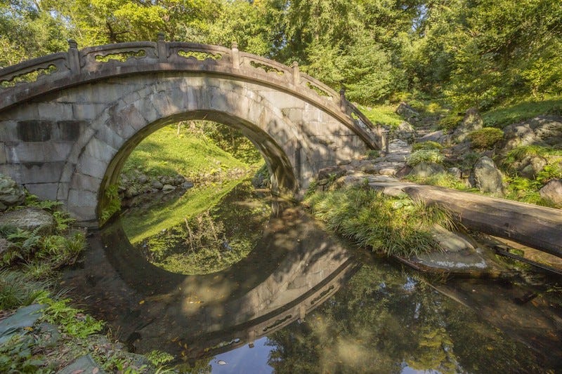 A moon-shaped archway at Tokyo’s traditional Japanese garden, Koishikawa Korakuen