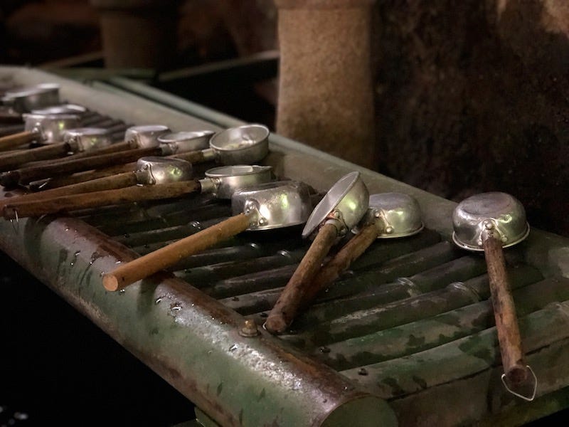 Laddles for washing money at Kamakura’s Zeniarai Benten Shrine in Kanagawa Prefecture