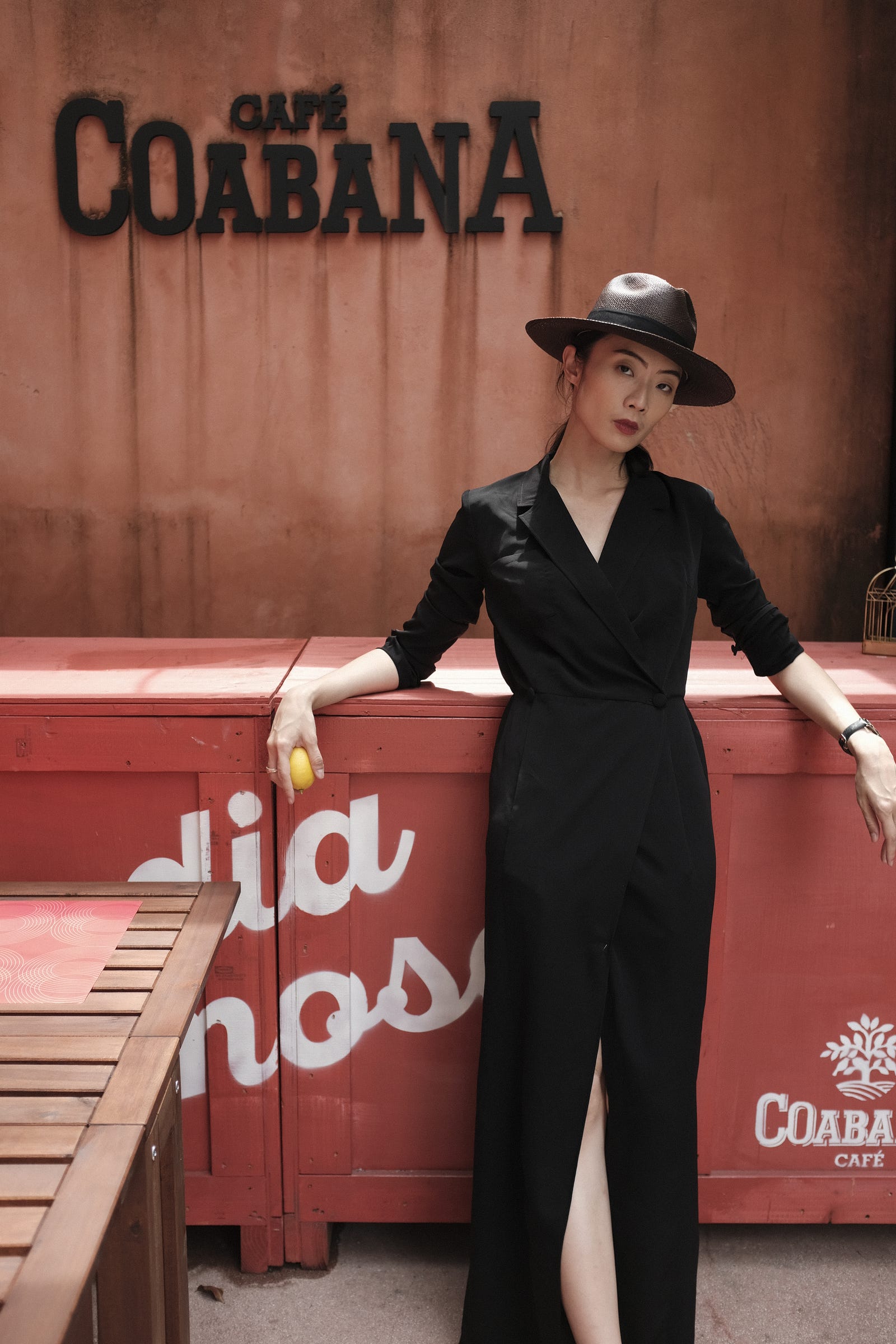 Norelle Weng wearing the black shirt dress by Bastet Noir