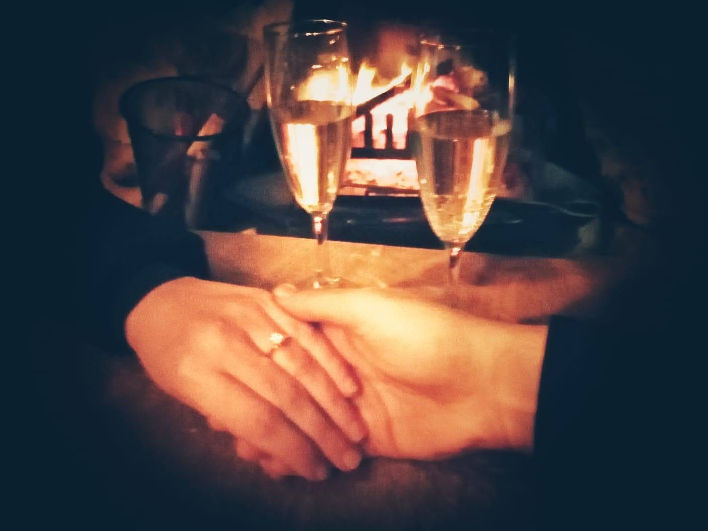 Hands holding, where one has an engagement ring
