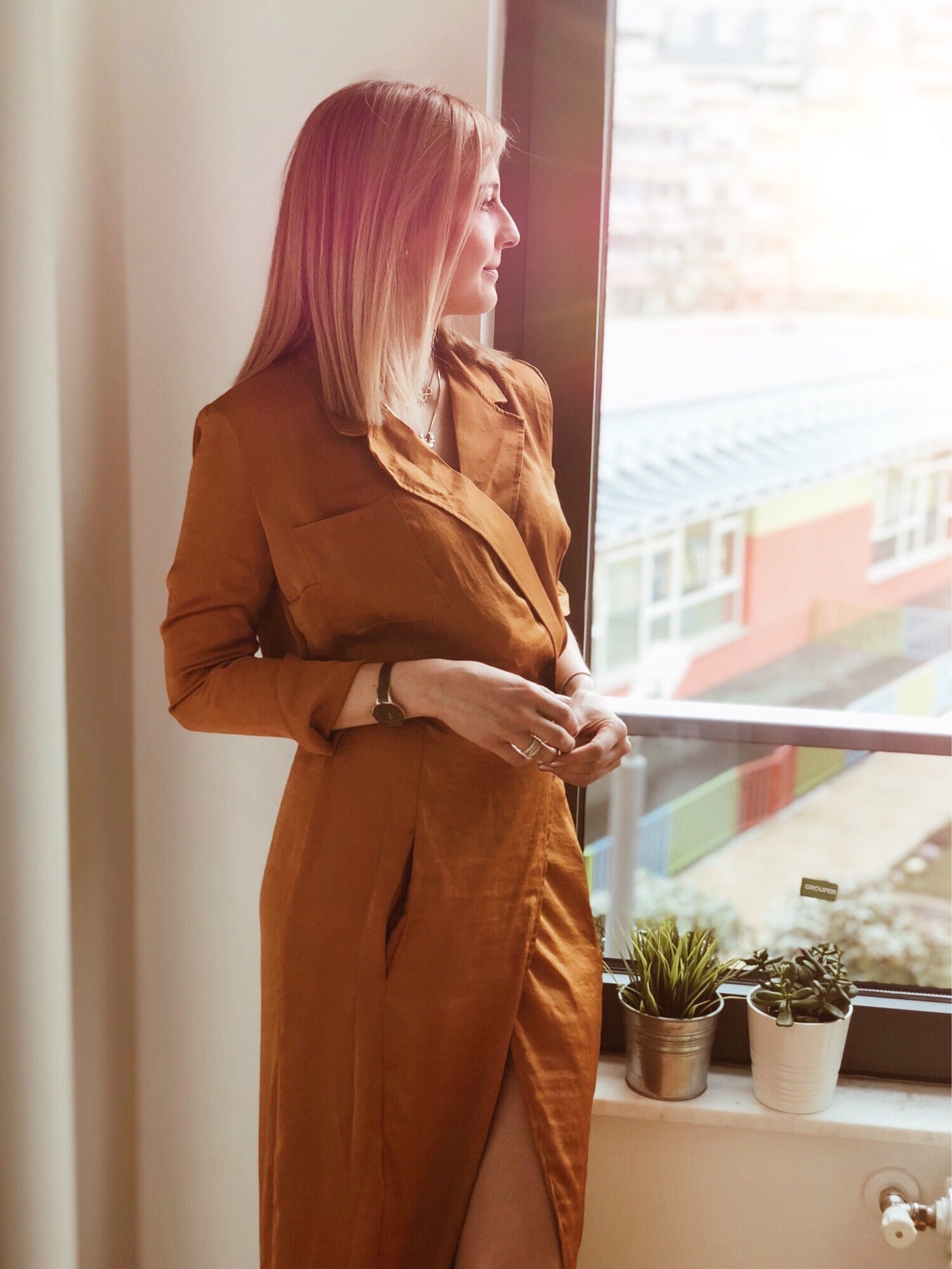 Nina Angelovska, Forbes30under30 is wearing the marigold shirt dress