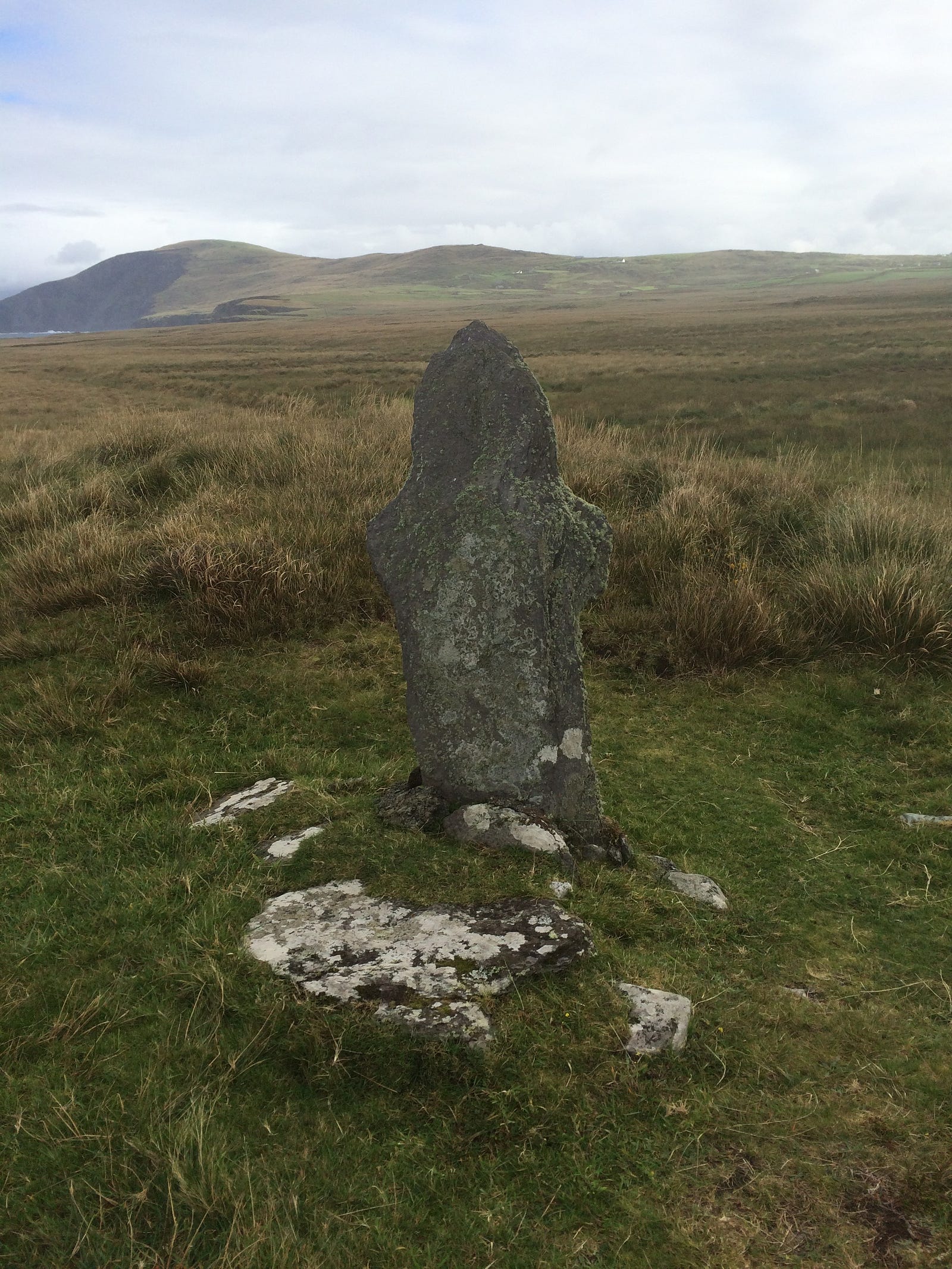 Photo of a standing stone cross on a 
