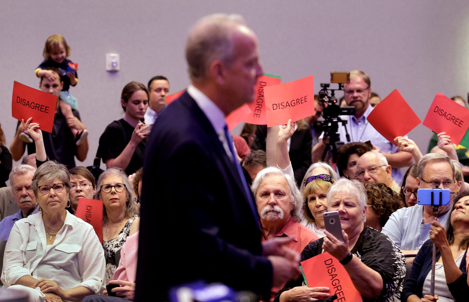 Sen. Moran faces tough health care questions in home county