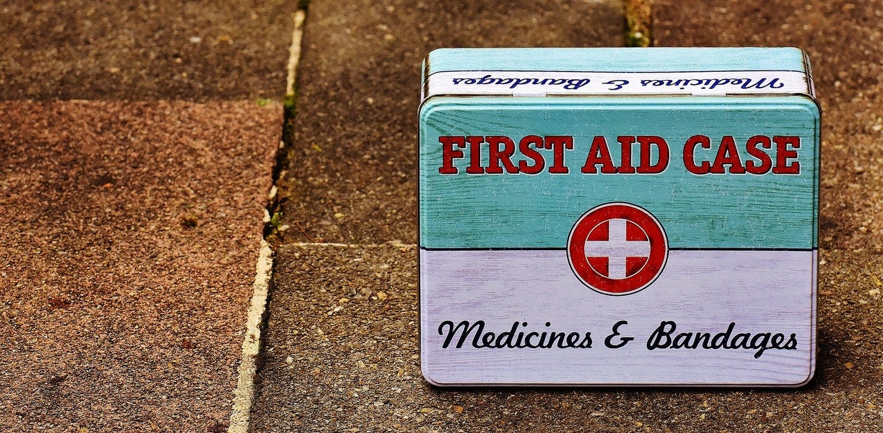first aid kit, case, medicines and bandages,