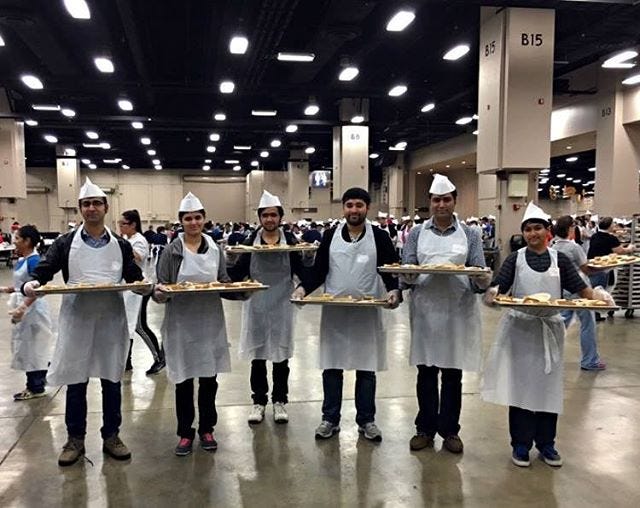 Pakistani IVLP participants volunteered their time at the 35th annual Raul Jimenez Thanksgiving Dinner in San Antonio, Texas in 2015. (State Department photo)