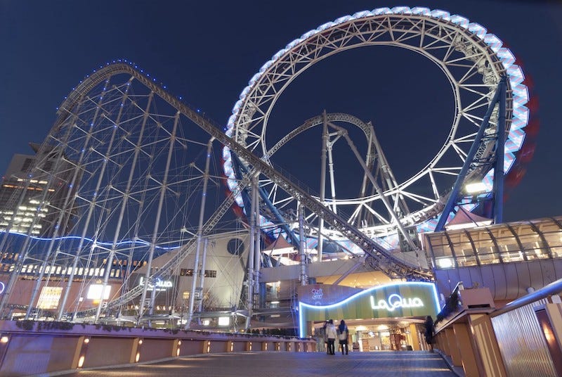 The Tokyo Dome City amusement park near the traditional garden of Koishikawa Korakuen