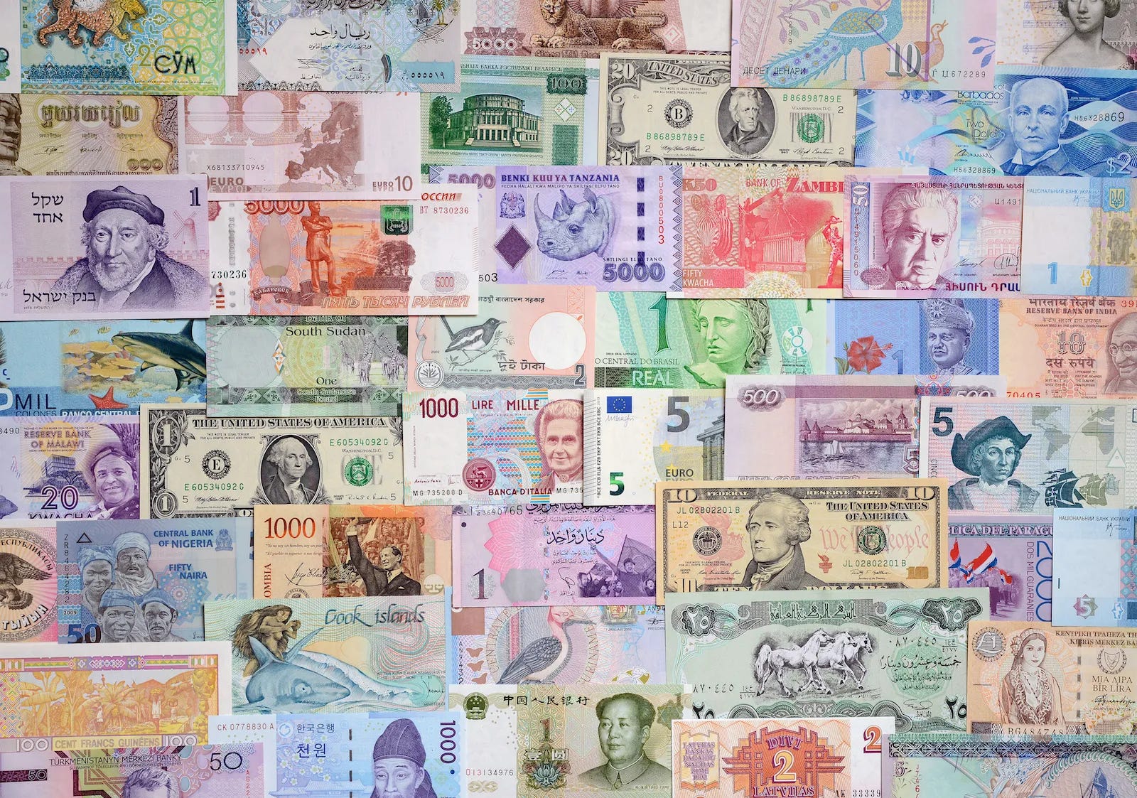 Cryptocurrency Better vs. Fiat: Scattered banknotes of different fiat currencies