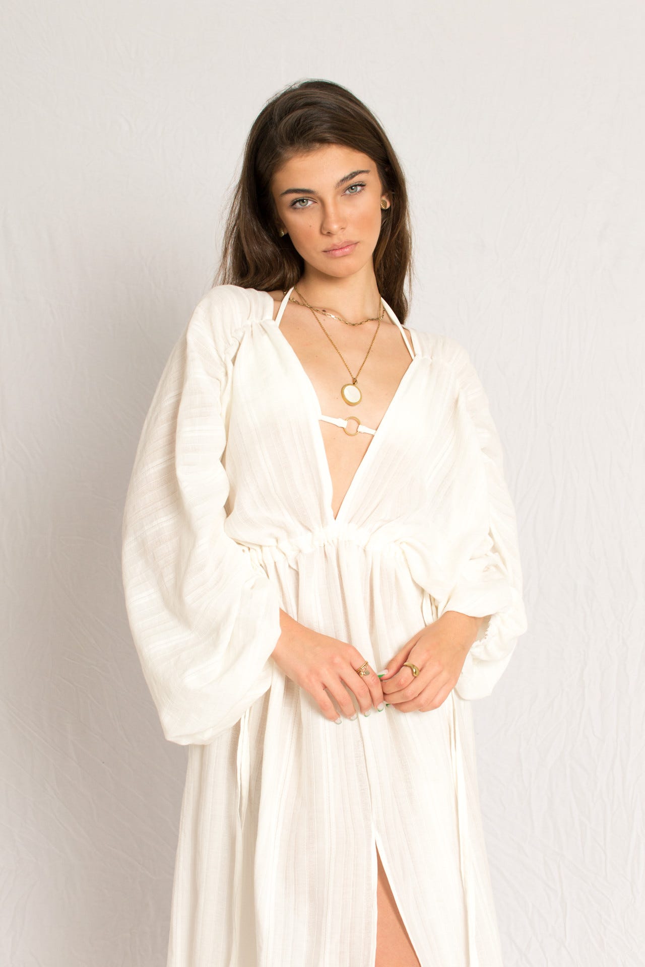 Maxi white kaftan beachwear dress with long sleeves, side slits and ruched waistline