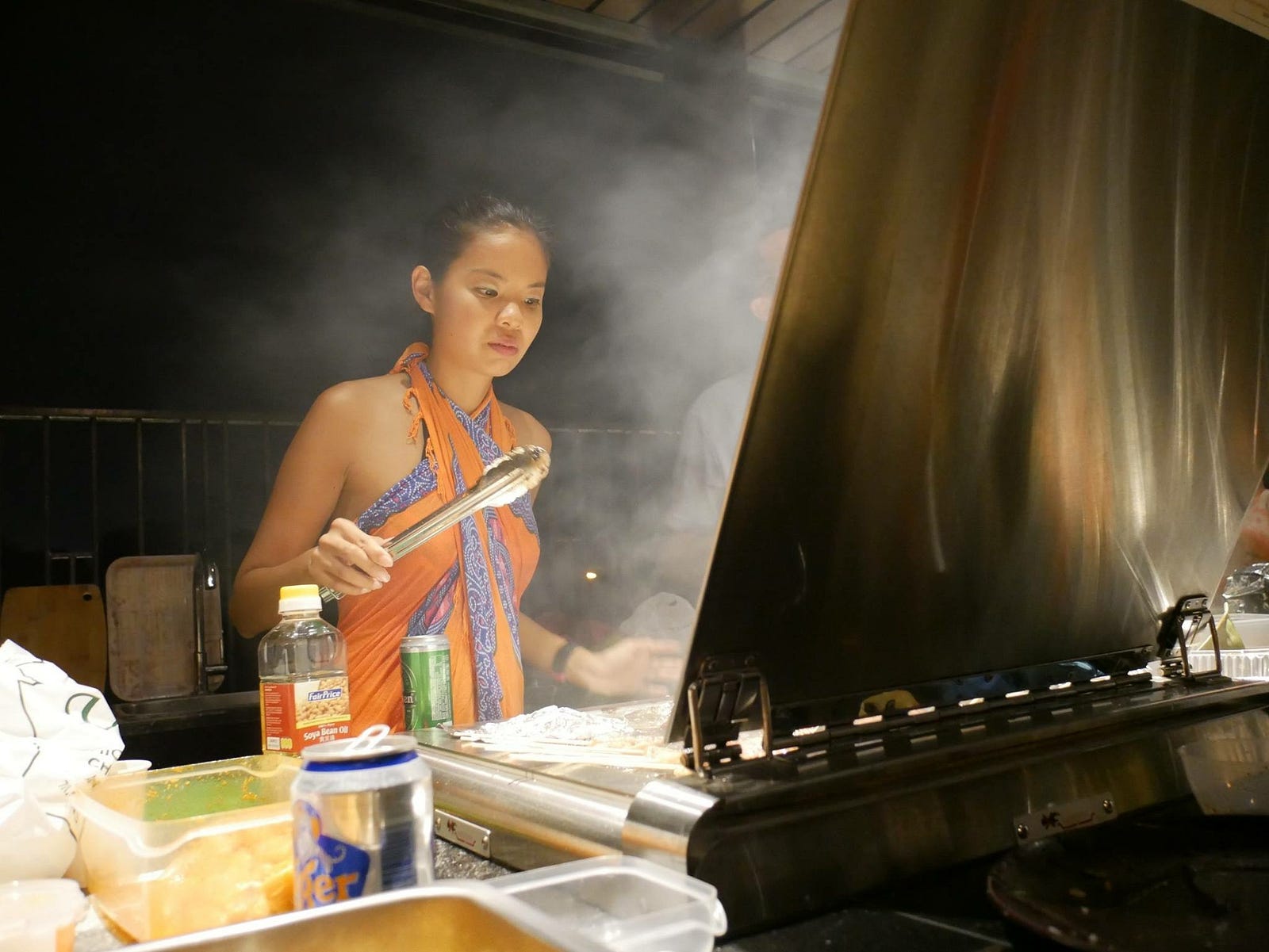 Jobbaticler Nicole Tan cooking Asian food.