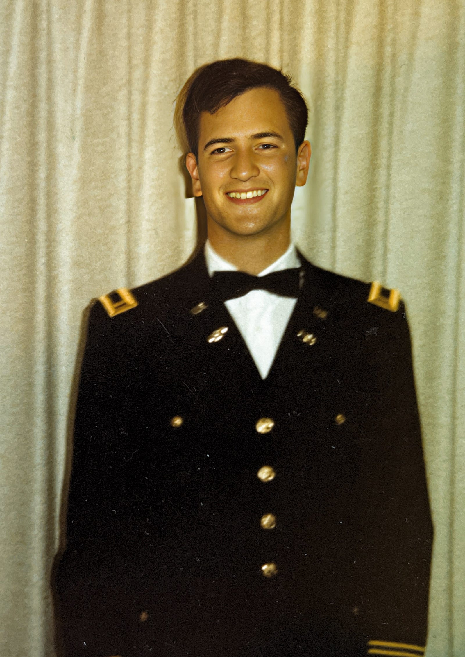 Second Lieutenant Anthony J. Carbone in his Dress Blue uniform with shoulder boards of Cobalt Blue indicating that he is a Chemical Corps Officer.