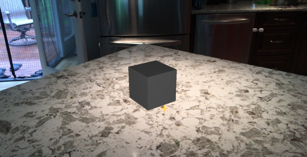 dark cube in bright room