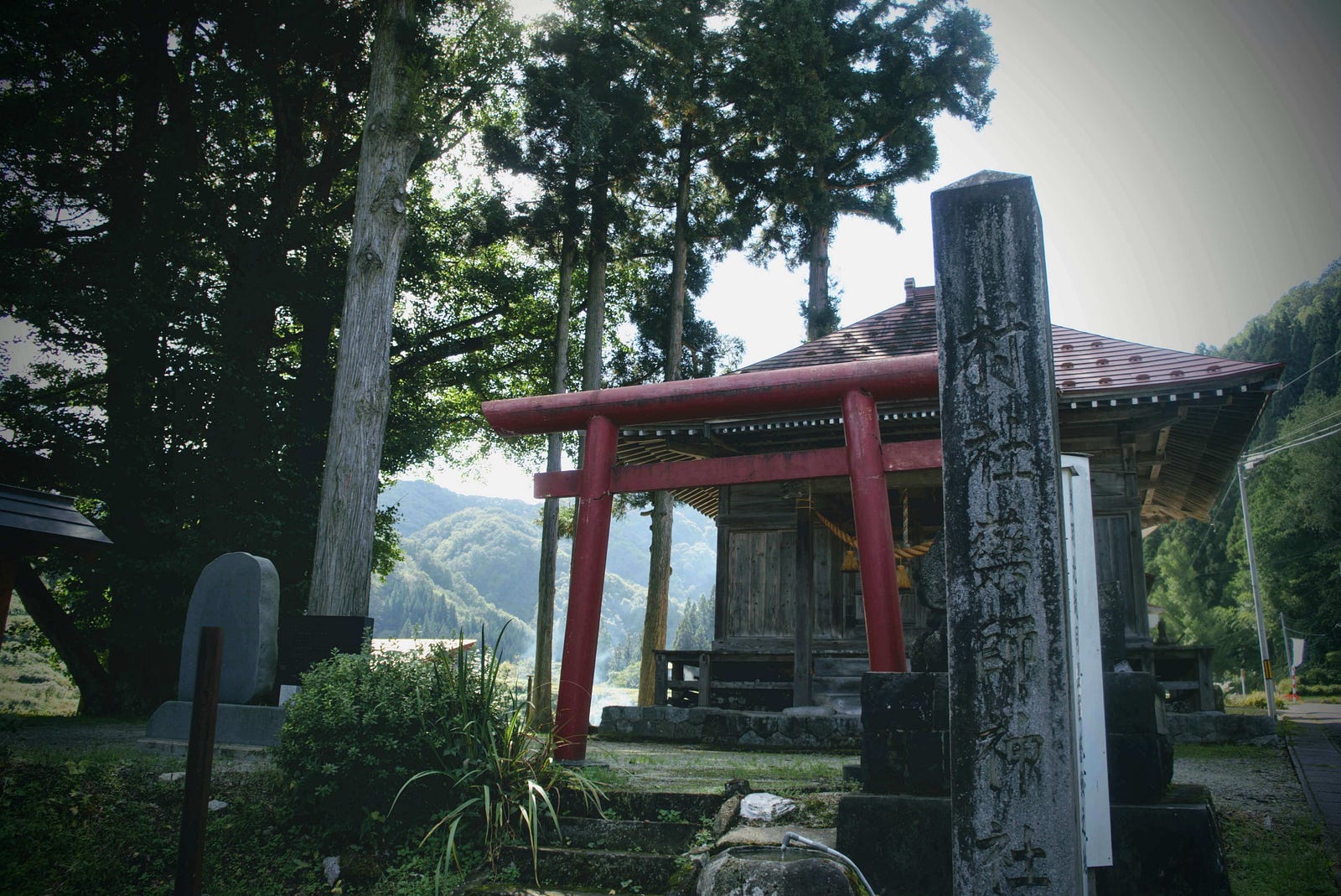 Yakushi shrine with bright red Torii gates in Sekigawa, near the Sekigawa Entrance to Mt. Maya.