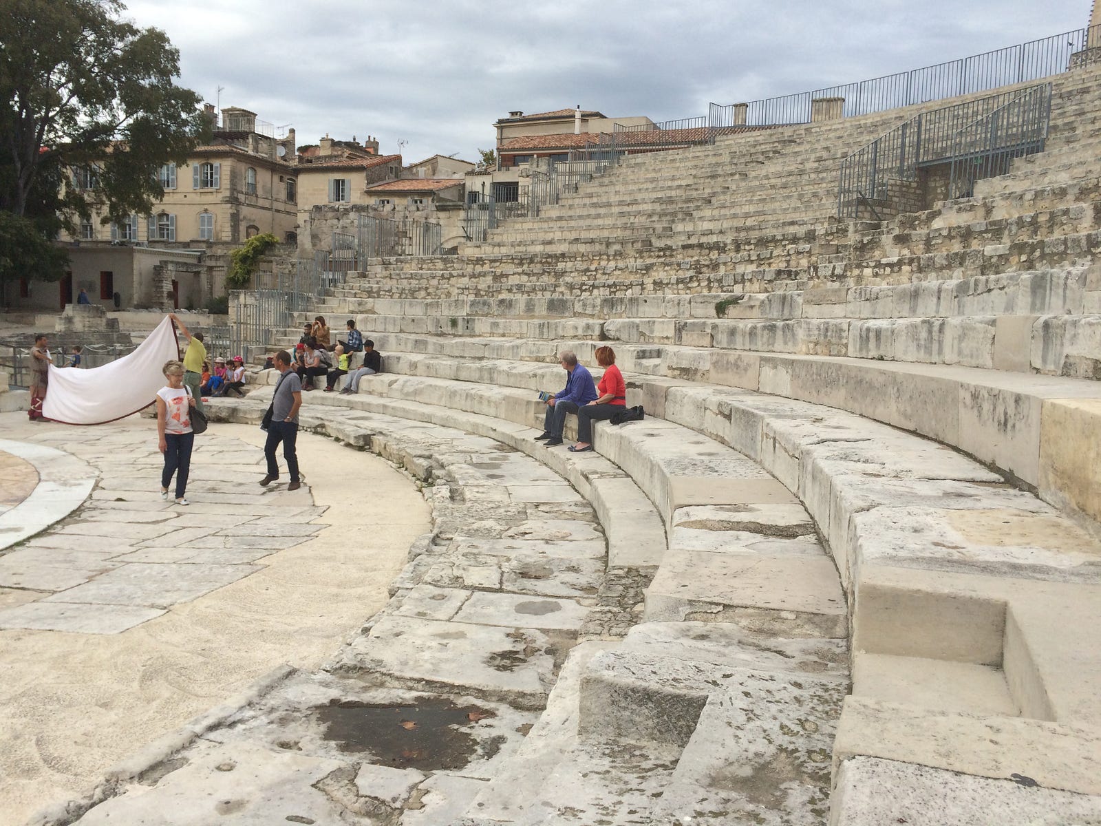 Photo of a Roman theatre in Arles, France on a cloudy day in summer. Photo by Ron Steed