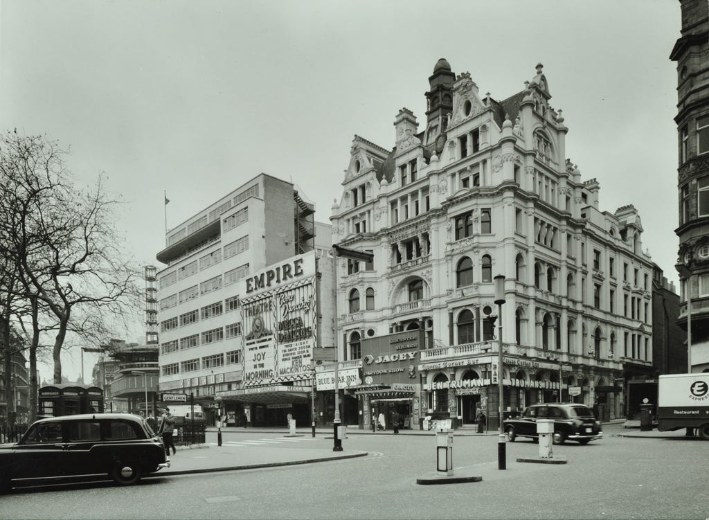 Picture showing roads and light traffic and the Empire Theatre in 1966