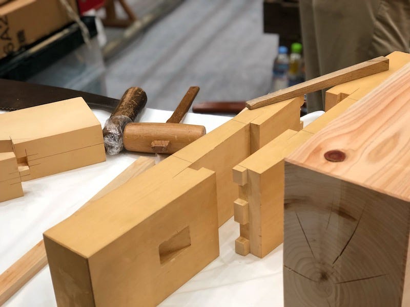Craftsmen build a building in Japan with a technique used as miyadaiku that doesn’t use any nails