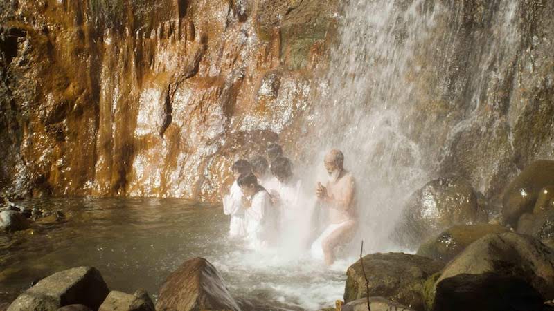 A group of yamabushi mountain practice waterfall meditation somewhere in Yamagata Prefecture