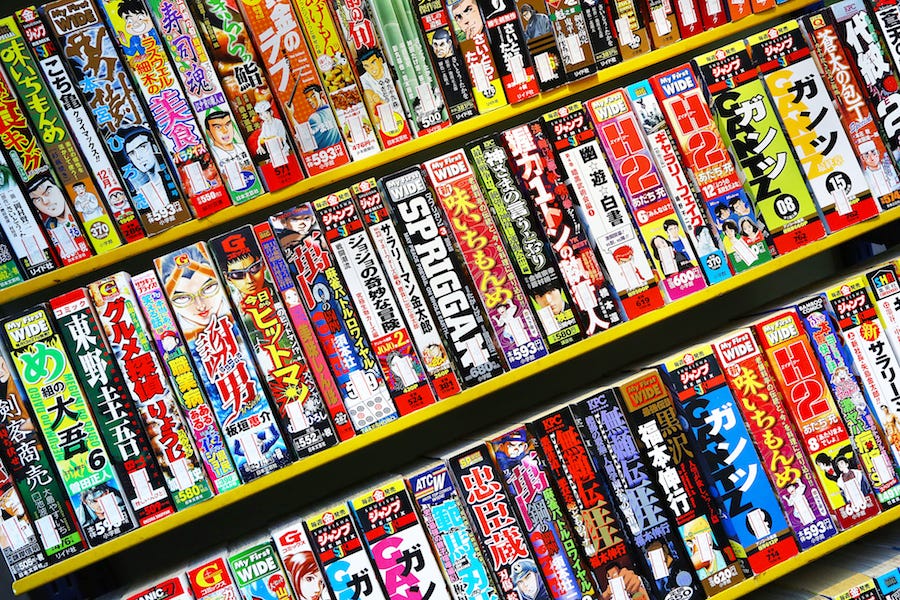 Rows and rows of manga in a Japanese manga cafe