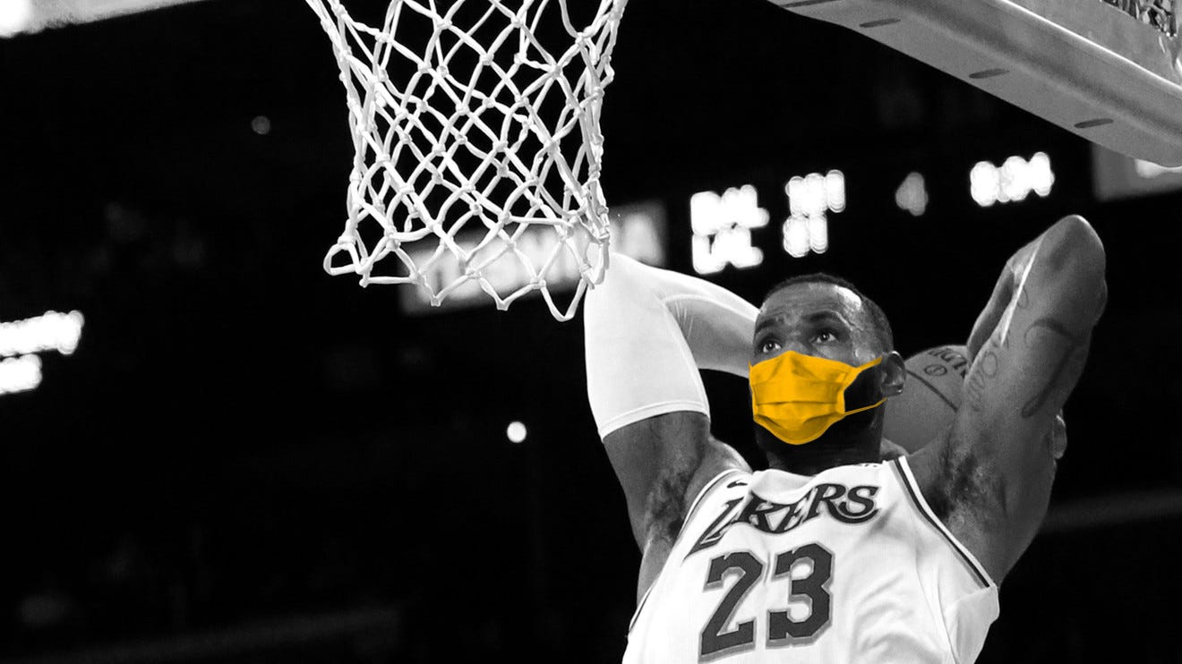 LeBron dunking in a mask