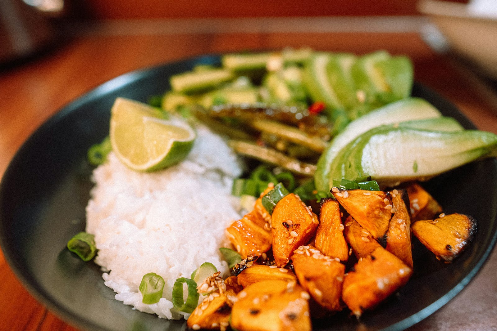 Sliced carrots and vegetables on plate