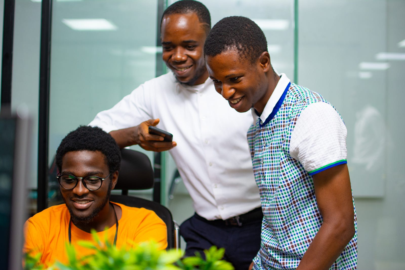 A group of trainees learning to code